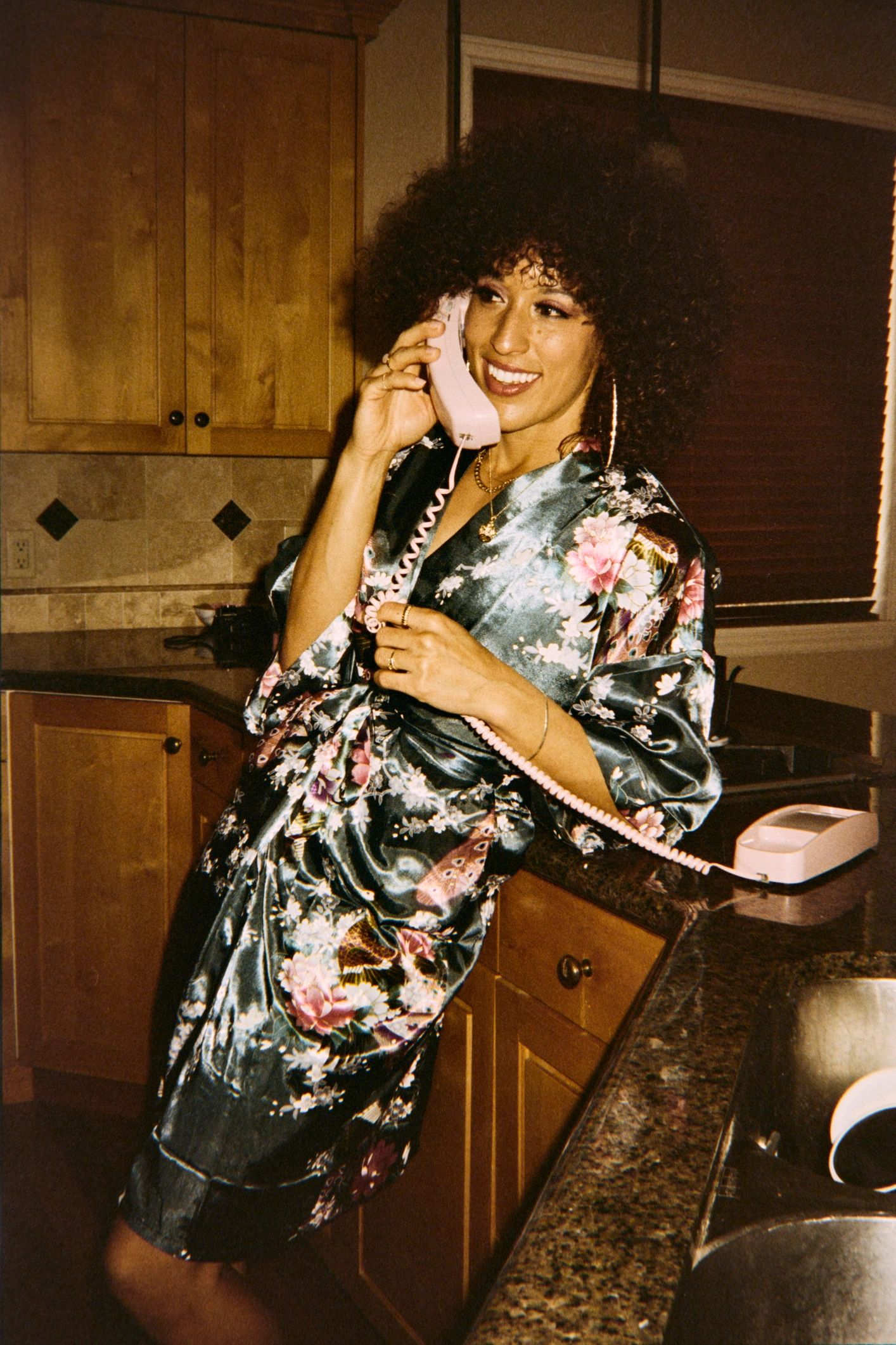 Person using a phone at home while seeking support