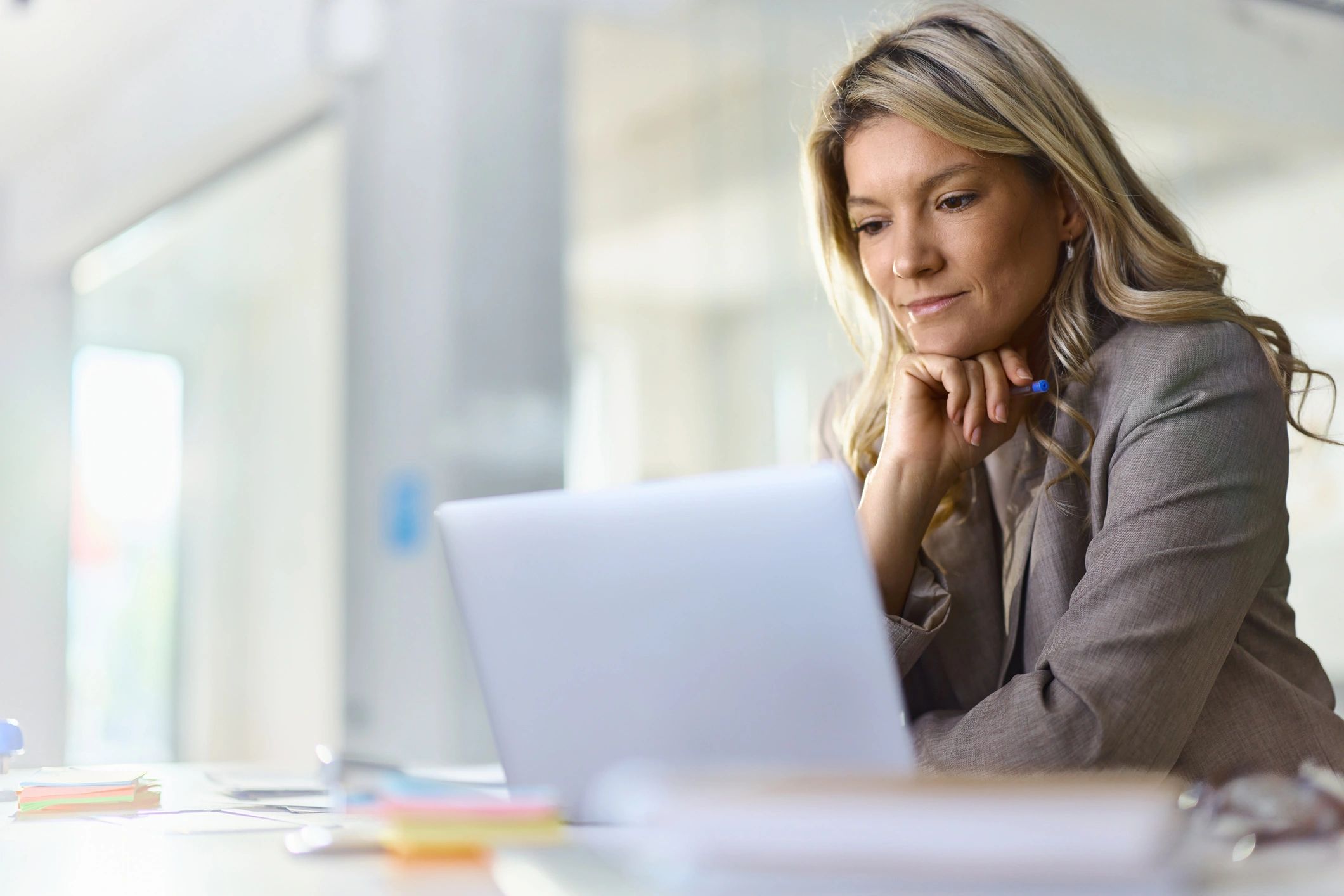 Person using a laptop to access online support